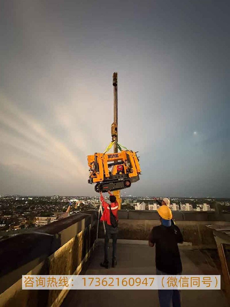 国产蜘蛛吊车扬帆出海 聚坤1.2吨微型蜘蛛吊车助力马来西亚城市建设